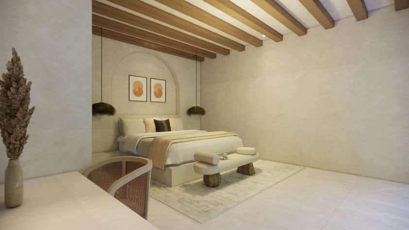 Guest bedroom with Balinese style wooden ceiling beams.