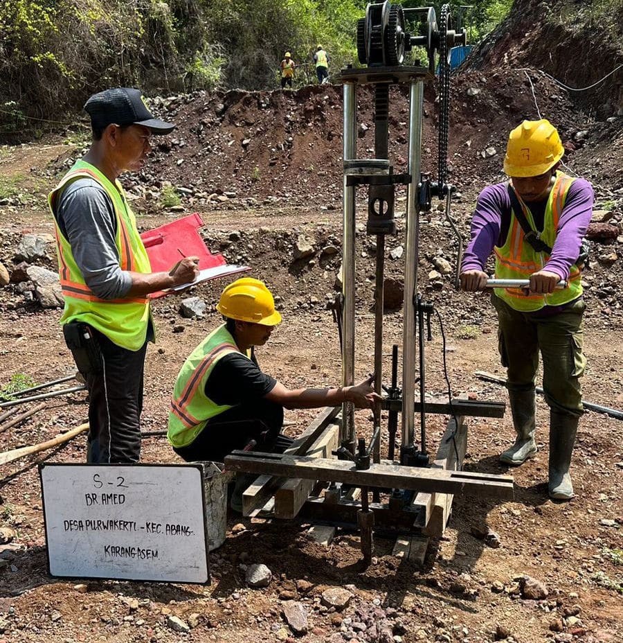 Engineers drilling for artesinal water in Amed, Bali.