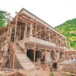 Building as 2-storey villa in Amed with bamboo scaffolding.