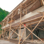 Bamboo scaffolding building villas in Amed, Bali.
