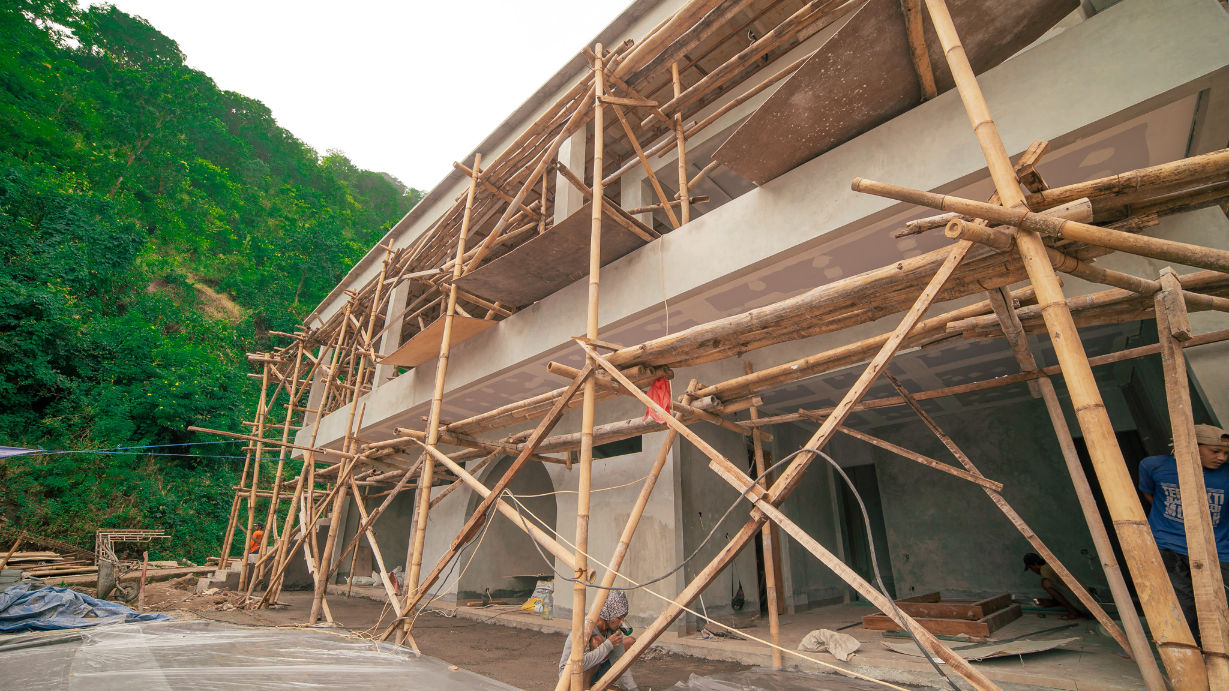 Bamboo scaffolding building villas in Amed, Bali.
