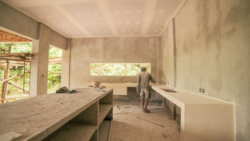 Building contractor working on the kitchen in Villa 9 on the Vesica Villas Celuke complex in Amed